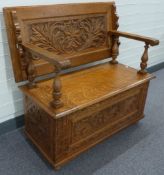 Early 20thC carved oak monk's bench, W107 x D58 x H104cm
