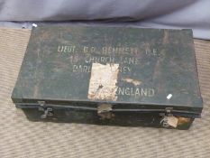 A twin handled military metal trunk and three vintage leather suitcases, one khaki covered, kit