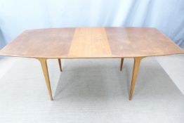 A retro McIntosh shaped table, W153 D91 H74cm