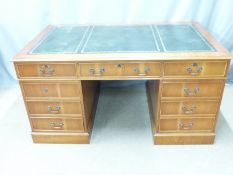 A leather inset mahogany twin pedestal desk, W150 D92 H78cm