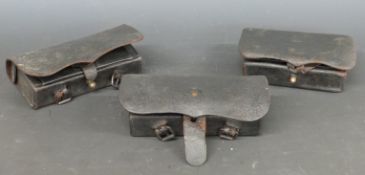 Three American Civil War cartridge pouches, two fitted with 20 cartridge wooden holders, all with