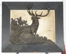 A bronze/spelter relief of a stag, W38 H38cm