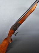 Baikal IJ-18 12 bore single barrelled shotgun with engraved animal scenes to the lock, chequered
