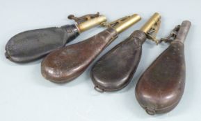 Four leather and brass shot flasks, three with belt loops, largest 21.5cm long.