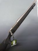 Remington Model 700 .25-06REM bolt-action rifle with semi-pistol grip, sling suspension mounts and