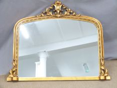 An ornate overmantel mirror, W115 H120cm