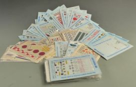 A very large collection of toy and model decals/ stickers all mounted on sheets.