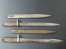 Two German Ersatz all steel bayonets, one stamped 2101 to crosspiece, both with 31cm fullered blades