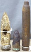 Three gun rounds, in fired condition, largest approximately 3.5 inch calibre. Consigned by a Royal