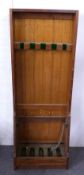 Wooden shop display gun rack with five fitted compartments, 50x26x137cm.
