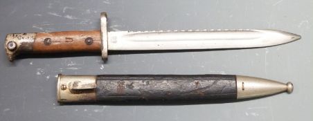 German 71/84 pattern sawback bayonet with muzzle ring and shaped grips, WK&C makers to ricasso, 25cm
