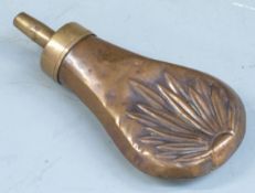 Copper and brass pistol or revolver powder flask with embossed decoration to both sides, 11cm long.
