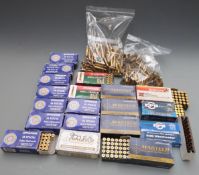 A large collection of .38SPL empty brass rifle cartridge cases.