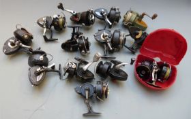 Thirteen mainly Intrepid fixed spool fishing reels including one boxed, early examples and a '
