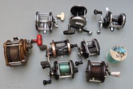 Eight multiplier fishing reels including Abu Ambassadeur 12, International 20, Intrepid Pirate,