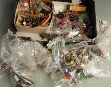 A very large collection of Britains and similar model soldiers including cowboys and Indians,