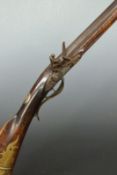 Ketland flintlock Kentucky rifle with named lock, brass trigger guard, butt plate and mounts,