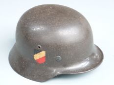 German Third Reich Nazi WWII steel helmet with double decals stamped 13103 and EF64, complete with