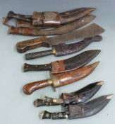 A collection of kukris, machetes etc, longest 50cm