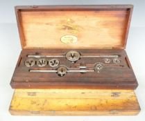 Three cased sets of taps and dies comprising metric, UNC and UNF