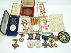 A group of British Red Cross and other medals and a Civil Defence Long Service Medal with sundry
