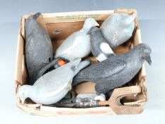 Crow, pigeon and magpie decoys, a container of shot, ear defenders and a stand
