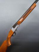 BSA 20 bore single barrelled folding poacher's shotgun with chequered semi-pistol grip and forend,