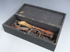 A collection of mainly 19thC African tribal thrusting knives, African tribal currency, knife handles