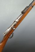Mauser 1871/84 bolt action rifle with inpressed marks to the stock, sling suspension mounts, steel