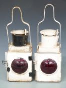 Two railway or similar brake or tail lamps, height 52cm