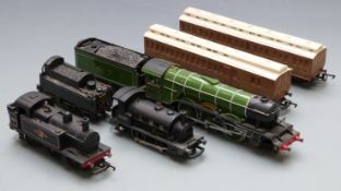 Five Tri-ang and Hornby 00 gauge locomotives and coaches including The Flying Scotsman, LMS and BR