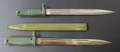 Two German Ersatz all steel bayonets, both with 31.5cm fullered blades one with scabbard