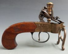 Flintlock tinder pistol lighter with engraved lock, shaped walnut grip, steel trigger guard and line