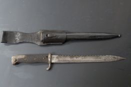 German KS98/ 02 style sawback bayonet, with leather grips, sweptback quillon and W.K & C maker's