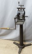 A vintage hand cranked iron milling machine, possibly for jewellery manufacturing, H121cm