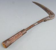 A 19thC Afghan Lohar war axe or pick with curved blade, inlaid wooden grip  and Damascened blade,