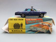 Corgi Toys diecast model The Man From UNCLE Gun Firing 'Thrush Buster' with purple body, lemon