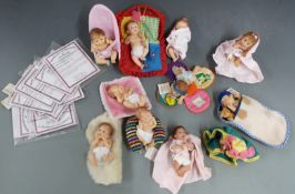 Eleven Ashton Drake Galleries resin baby dolls, largest 10cm tall, all with certificates.