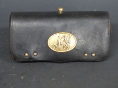 American Civil War era leather cartridge pouch with brass fittings including NG and McKenny & Co,