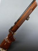 Valmet .22 bolt action target rifle with adjustable butt plate, cheek piece and trigger, shaped grip