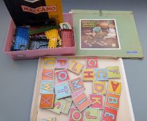 A collection of Meccano parts including Book of Models 2 together with a set of Victory wooden