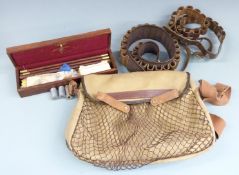 A canvas cartridge or game bag together with two leather 12 bore shotgun cartridge belts, cleaning
