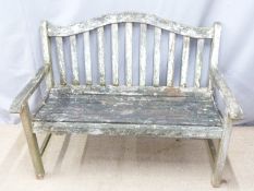 A teak garden bench, W122cm