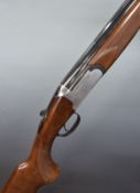 Lincoln Premier 20 bore over and under ejector shotgun with engraved scenes of animals to the