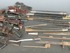 A small collection of bayonet related items comprising scabbards, frogs etc