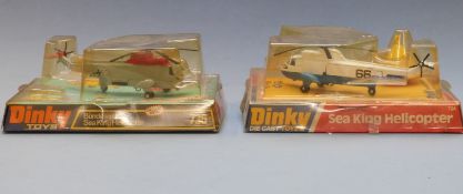 Two Dinky Toys diecast model helicopters Sea King 724 and Bundesmarine Sea King 736, both in