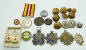 A small collection of badges and buttons including Freemasons silver gilt and silver and enamel