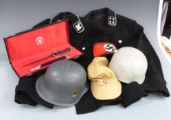 Quantity of reproduction German WWII helmets, uniform and cased dagger