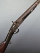 Unnamed 12 bore percussion hammer action gun with engraved lock, hammer, top plate and scrolling