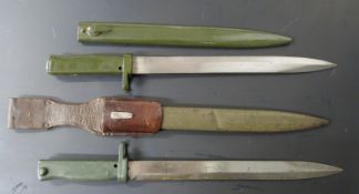 Two German Ersatz all steel bayonets, both with acceptance stamps, 31cm blades and scabbards, one